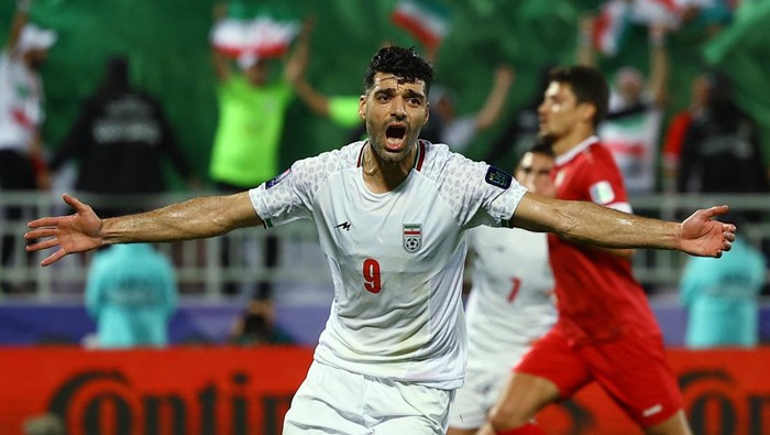 Soccer Football - AFC Asian Cup - Round of 16 - Iran v Syria - Abdullah bin Khalifa Stadium, Doha, Qatar - January 31, 2024 Irans Mehdi Taremi celebrates scoring their first goal REUTERS/Molly Darlington