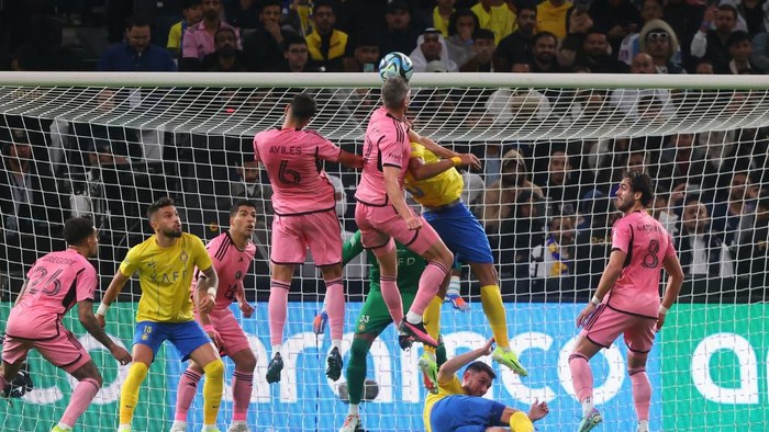 Inter Miamis Ukrainian defender #27 Sergii Kryvtsov leaps to head the ball during the friendly football match between Saudi Arabias al-Nassr FC and the US Inter Miami CF at the Kingdom Arena Stadium in Riyadh on February 1, 2024. (Photo by Fayez NURELDINE / AFP)