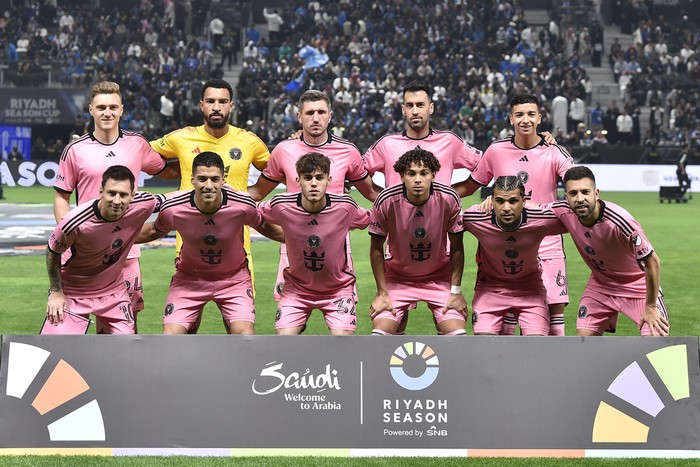 Inter Miami's players pose for a group picture during the Riyadh Season Cup soccer match between Inter Miami and Al Hilal at Kingdom Arena Stadium in Riyadh, Saudi Arabia, Monday, Jan. 29, 2024. (AP Photo)