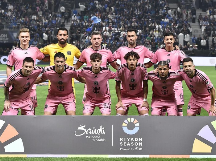 Inter Miami's players pose for a group picture during the Riyadh Season Cup soccer match between Inter Miami and Al Hilal at Kingdom Arena Stadium in Riyadh, Saudi Arabia, Monday, Jan. 29, 2024. (AP Photo)