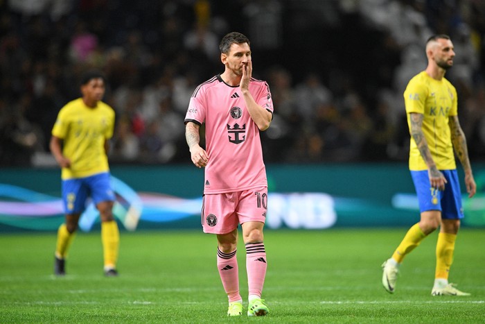 Lionel Messi Feb 1, 2024; Riyadh, Saudi Arabia; Inter Miami CF forward Lionel Messi (10) reacts after a play against Al-Nassr during the second half at Kingdom Arena. Mandatory Credit: Victor Fraile-USA TODAY Sports