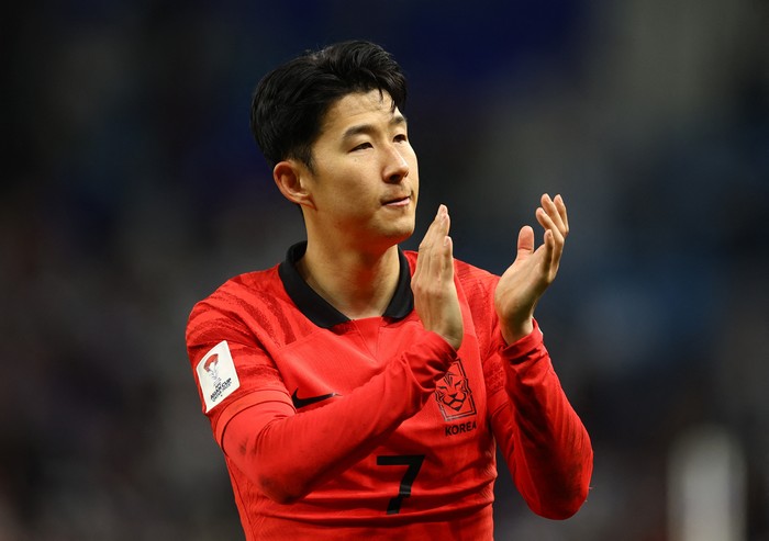 Soccer Football - AFC Asian Cup - Quarter Final - Australia v South Korea - Al Janoub Stadium, Al Wakrah, Qatar - February 2, 2024 South Koreas Son Heung-Min celebrates after the match REUTERS/Molly Darlington
