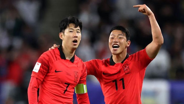 AL WAKRAH, QATAR - FEBRUARY 02: Son Heung-min of South Korea celebrates his goal with Hwang Hee-chan of South Korea during the AFC Asian Cup quarter final match between Australia and South Korea at Al Janoub Stadium on February 02, 2024 in Al Wakrah, Qatar. (Photo by Robert Cianflone/Getty Images)