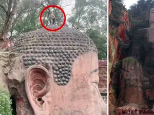 Turis Kurang Ajar! Ia Pipis di Kepala Patung Buddha Terbesar Dunia