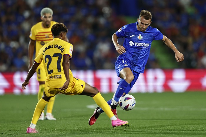 Borja Mayoral Barcelona's Lamine Yamal, centre, and Getafe's Borja Mayoral challenge for the ball during the Spanish La Liga soccer match between Getafe and FC Barcelona at the Coliseum Alfonso Perez stadium in Getafe, Spain, Sunday, Aug. 13, 2023. (AP Photo/Alvaro Medranda)