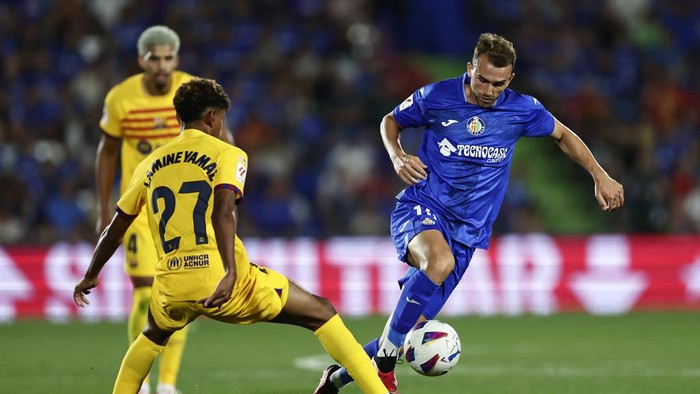 Borja Mayoral Barcelona's Lamine Yamal, centre, and Getafe's Borja Mayoral challenge for the ball during the Spanish La Liga soccer match between Getafe and FC Barcelona at the Coliseum Alfonso Perez stadium in Getafe, Spain, Sunday, Aug. 13, 2023. (AP Photo/Alvaro Medranda)