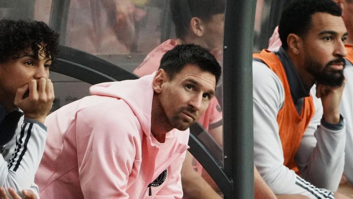 Soccer Football - Friendly - Hong Kong v Inter Miami - Hong Kong Stadium, Hong Kong - February 4, 2024 Inter Miamis Lionel Messi looks on from the substitutes bench REUTERS/Lam Yik