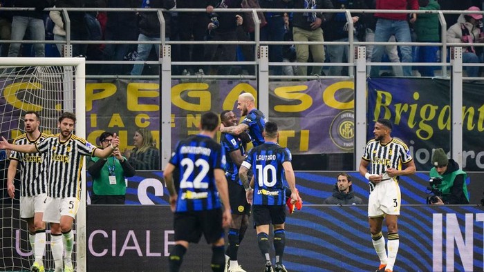 Federico Dimarco and Marcus Thuram of FC Inter are celebrating a goal during the Italian championship Serie A football match between FC Inter and Juventus FC at San Siro Stadium in Milan, Italy, on February 4, 2024. (Photo by Luca Rossini/NurPhoto via Getty Images)