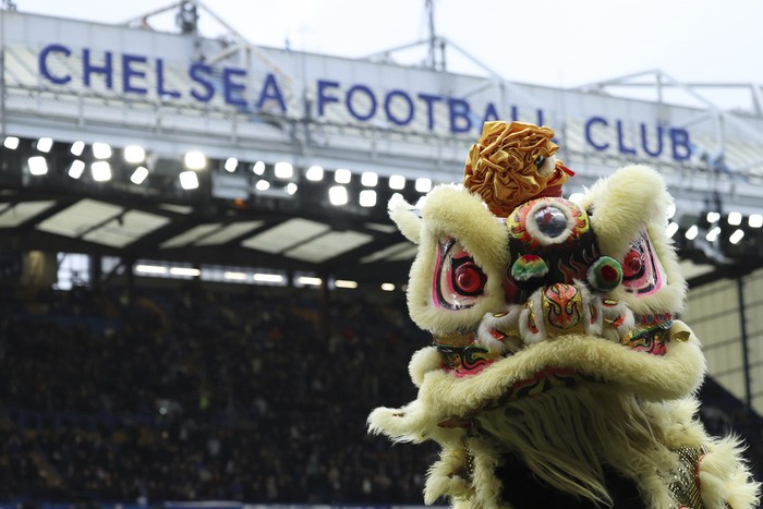 A Chinese dragon trades during the half time interval during the English Premier League soccer match between Chelsea and Wolverhampton Wanderers at Stamford Bridge stadium in London, Sunday, Feb. 4, 2024. The Chinese new year is Feb. 10, and will be the year of the Dragon.(AP Photo/Ian Walton)