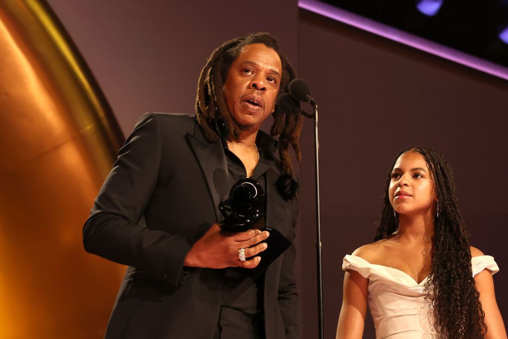 LOS ANGELES, CALIFORNIA - FEBRUARY 04: Jay-Z accepts the Dr. Dre Global Impact Award onstage with Blue Ivy Carter during the 66th GRAMMY Awards at Crypto.com Arena on February 04, 2024 in Los Angeles, California. (Photo by Johnny Nunez/Getty Images for The Recording Academy)