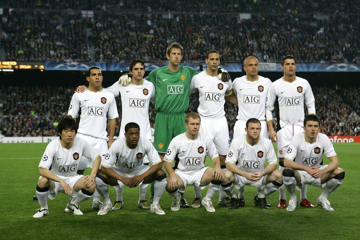  Dong Fangzhuo, Louis Saha, Paul Scholes, Wayne Rooney, Michael Carrick.  (AP Photo/Victor R. Caivano)