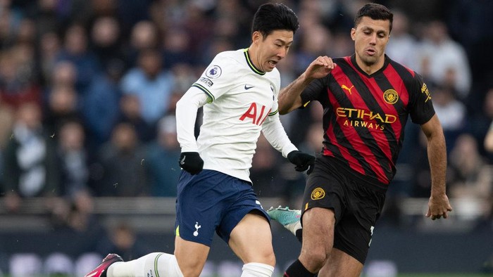 LONDON, ENGLAND - FEBRUARY 05:  Heung-Min Son of Tottenham Hotspur is tracked by Rodrigo Hernandez Rodri of Manchester City during the Premier League match between Tottenham Hotspur and Manchester City at Tottenham Hotspur Stadium on February 05, 2023 in London, England. (Photo by Visionhaus/Getty Images)