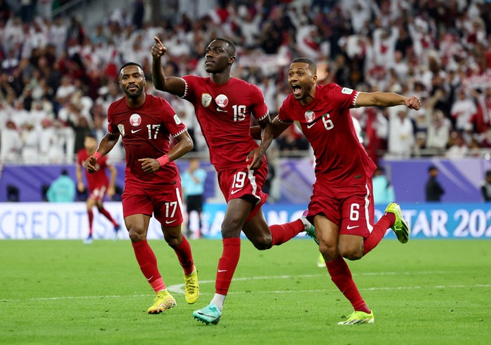 Soccer Football - AFC Asian Cup - Semi Final - Iran v Qatar - Al Thumama Stadium, Doha, Qatar - February 7, 2024 Qatars Almoez Ali celebrates scoring their third goal with Abdulaziz Hatem REUTERS/Molly Darlington     TPX IMAGES OF THE DAY