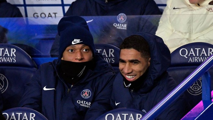 PARIS, FRANCE - FEBRUARY 10: Kylian Mbappe of Paris Saint-Germain reacts as he sits on the bench during the Ligue 1 Uber Eats match between Paris Saint-Germain and Lille OSC at Parc des Princes on February 10, 2024 in Paris, France. (Photo by Aurelien Meunier - PSG/PSG via Getty Images)
