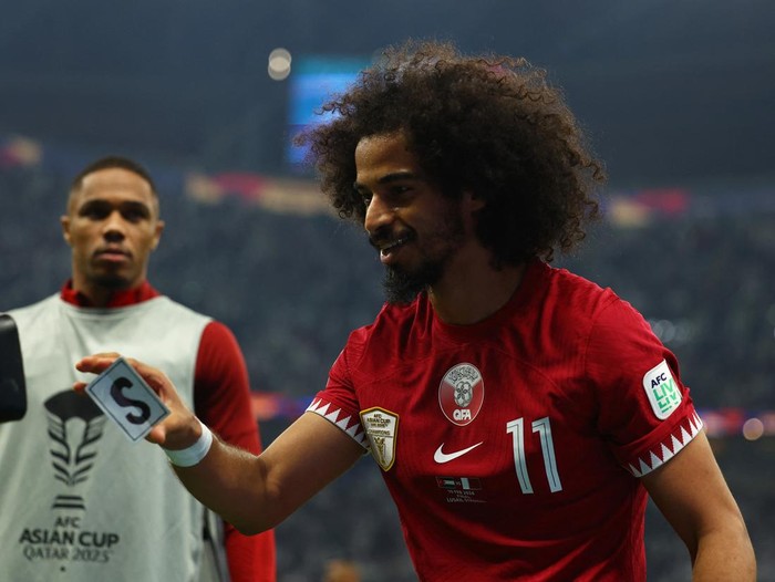 Soccer Football - AFC Asian Cup - Final - Jordan v Qatar - Lusail Stadium, Lusail, Qatar - February 10, 2024 Qatar's Akram Afif celebrates scoring their second goal REUTERS/Molly Darlington