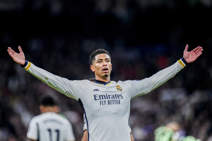 Real Madrids Jude Bellingham celebrates after scoring his sides third goal during a Spanish La Liga soccer match between Real Madrid and Girona at the Santiago Bernabeu stadium in Madrid, Spain, Saturday, Feb. 10, 2024. (AP Photo/Manu Fernandez)
