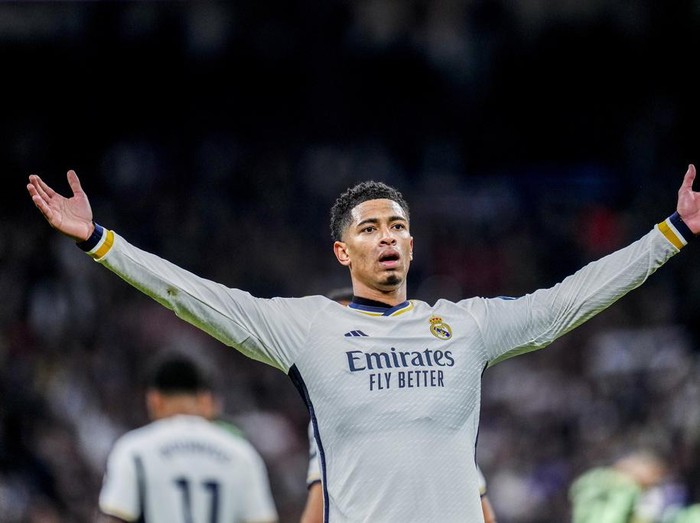 Real Madrid's Jude Bellingham celebrates after scoring his side's third goal during a Spanish La Liga soccer match between Real Madrid and Girona at the Santiago Bernabeu stadium in Madrid, Spain, Saturday, Feb. 10, 2024. (AP Photo/Manu Fernandez)