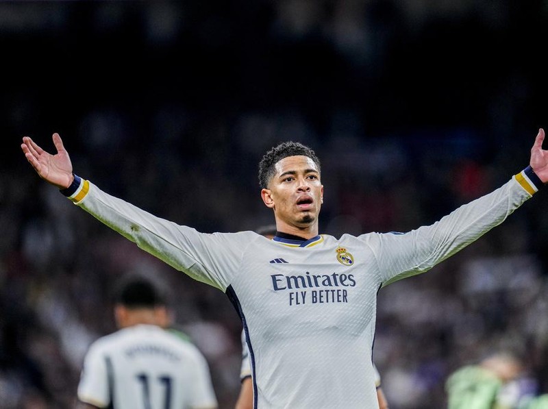 Real Madrid's Jude Bellingham celebrates after scoring his side's third goal during a Spanish La Liga soccer match between Real Madrid and Girona at the Santiago Bernabeu stadium in Madrid, Spain, Saturday, Feb. 10, 2024. (AP Photo/Manu Fernandez)