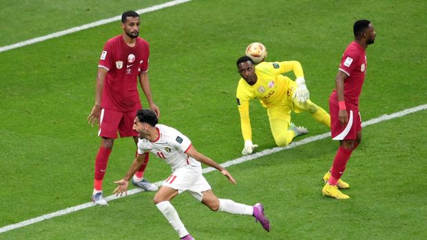 LUSAIL CITY, QATAR - FEBRUARY 10: Yazan Al-Naimat of Jordan celebrates scoring his team's first goal during the AFC Asian Cup final match between Jordan and Qatar at Lusail Stadium on February 10, 2024 in Lusail City, Qatar. (Photo by Adam Nurkiewicz/Getty Images)