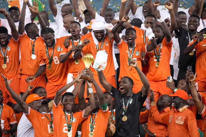 Ivory Coast players celebrate after winning the African Cup of Nations final soccer match between Nigeria and Ivory Coast, at the Olympic Stadium of Ebimpe in Abidjan, Ivory Coast, Sunday, Feb. 11, 2024. (AP Photo/Sunday Alamba)