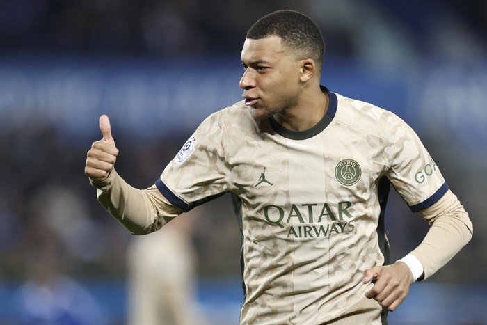 Kylian Mbappe PSG's Kylian Mbappe reacts during the French League One soccer match between Strasbourg and Paris Saint-Germain at Stade de la Meinau stadium in Strasbourg, France, Friday, Feb. 2, 2024. (AP Photo/Jean-Francois Badias)