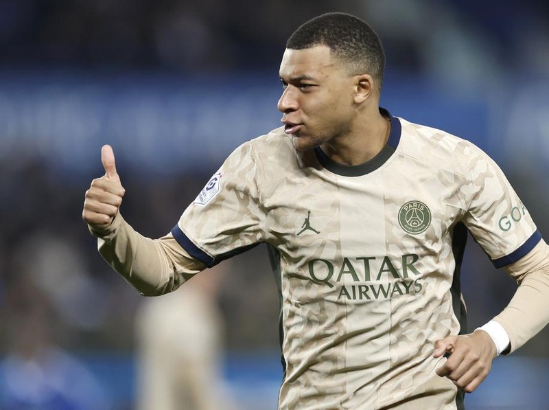 PSG's Kylian Mbappe reacts during the French League One soccer match between Strasbourg and Paris Saint-Germain at Stade de la Meinau stadium in Strasbourg, France, Friday, Feb. 2, 2024. (AP Photo/Jean-Francois Badias)