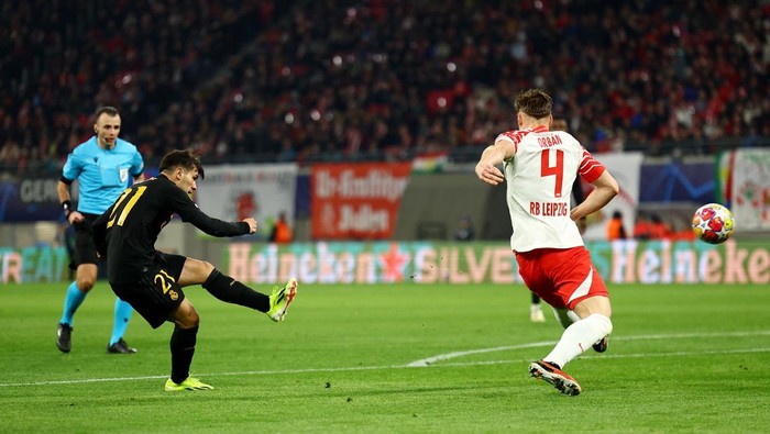 Brahim Diaz Soccer Football - Champions League - Round of 16 - First Leg - RB Leipzig v Real Madrid - Red Bull Arena, Leipzig, Germany - February 13, 2024 Real Madrid's Brahim Diaz scores their first goal REUTERS/Lisi Niesner
