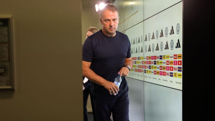WOLFSBURG, GERMANY - SEPTEMBER 9: Hansi Hans-Dieter Flick Head Coach of Germany exit after press conference after the international friendly match between Germany and Japan at Volkswagen Arena on September 9, 2023 in Wolfsburg, Germany. (Photo by Jürgen Fromme - firo sportphoto/Getty Images)