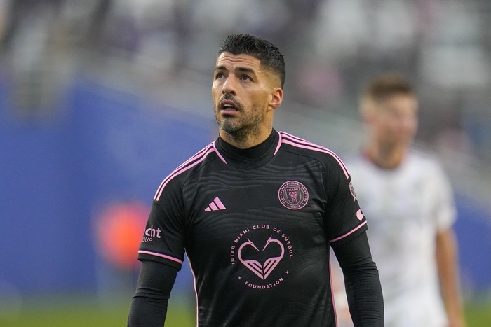 Inter Miami forward Luis Suarez looks on between plays against FC Dallas during the first half of a preseason friendly MLS soccer match Monday, Jan. 22, 2024, at the Cotton Bowl in Dallas. (AP Photo/Julio Cortez)