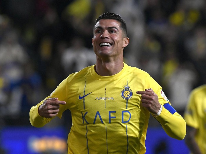 Soccer Football - Saudi Pro League - Al Nassr v Al Fateh - Al-Awwal Park, Riyadh, Saudi Arabia - February 17, 2024 Al Nassr's Cristiano Ronaldo celebrates scoring their first goal REUTERS/Yazeed Aldhawaihi