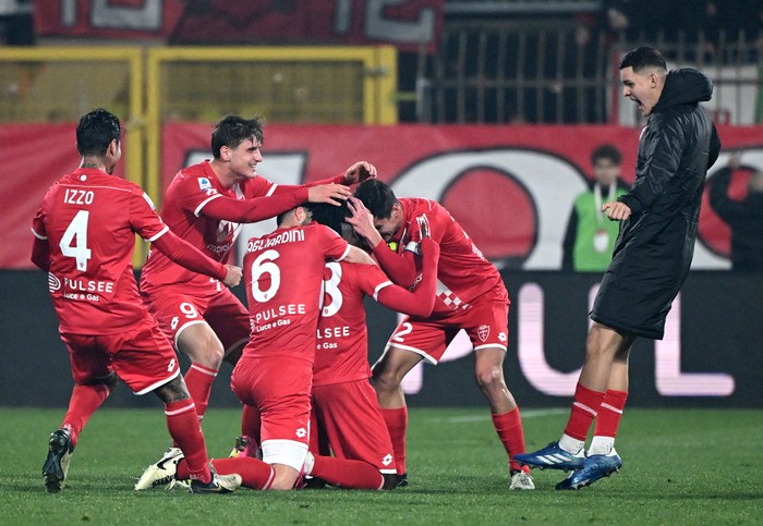 Soccer Football - Serie A - Monza v AC Milan - Stadio Brianteo, Monza, Italy - February 18, 2024 Monzas Warren Bondo celebrates scoring their third goal with teammates REUTERS/Alberto Lingria