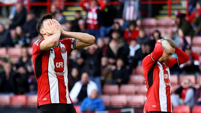 Soccer Football - Premier League - Sheffield United v Brighton & Hove Albion - Bramall Lane, Sheffield, Britain - February 18, 2024 Sheffield Uniteds Anel Ahmedhodzic looks dejected after Brighton & Hove Albions Simon Adingra scores their fifth goal REUTERS/Carl Recine NO USE WITH UNAUTHORIZED AUDIO, VIDEO, DATA, FIXTURE LISTS, CLUB/LEAGUE LOGOS OR LIVE SERVICES. ONLINE IN-MATCH USE LIMITED TO 45 IMAGES, NO VIDEO EMULATION. NO USE IN BETTING, GAMES OR SINGLE CLUB/LEAGUE/PLAYER PUBLICATIONS.