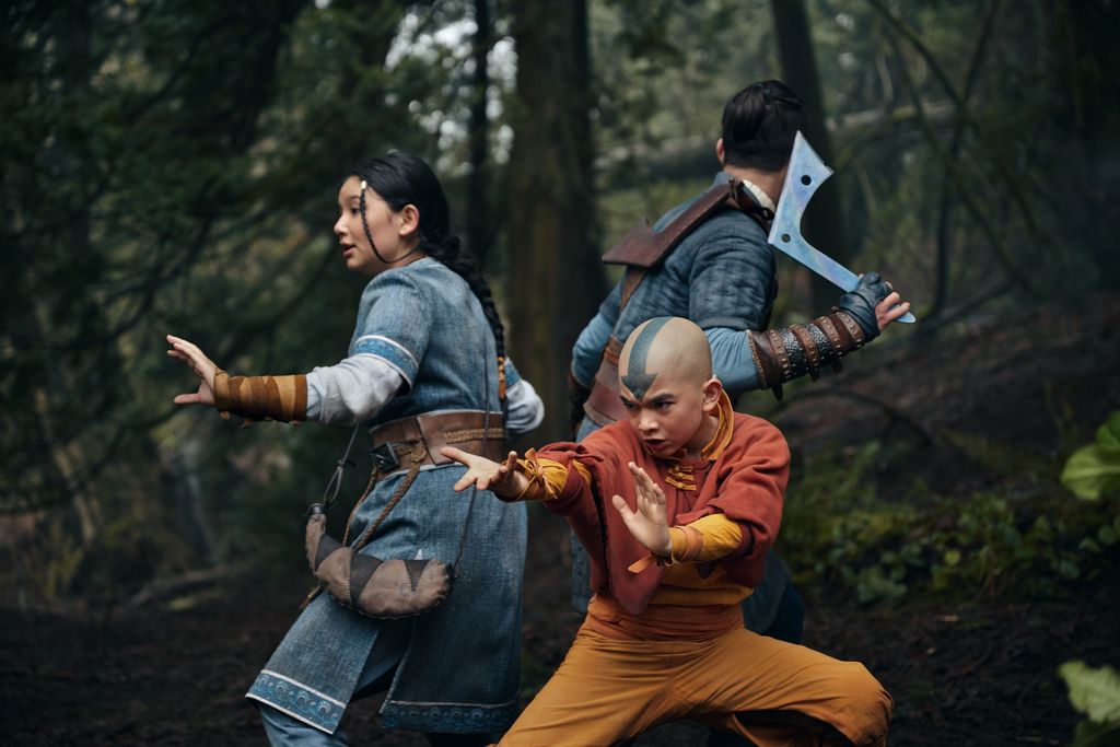 Avatar: The Last Airbender. (L to R) Gordon Cormier as Aang, Kiawentiio as Katara, Ian Ousley as Sokka in season 1 of Avatar: The Last Airbender. Cr. Robert Falconer/Netflix © 2023