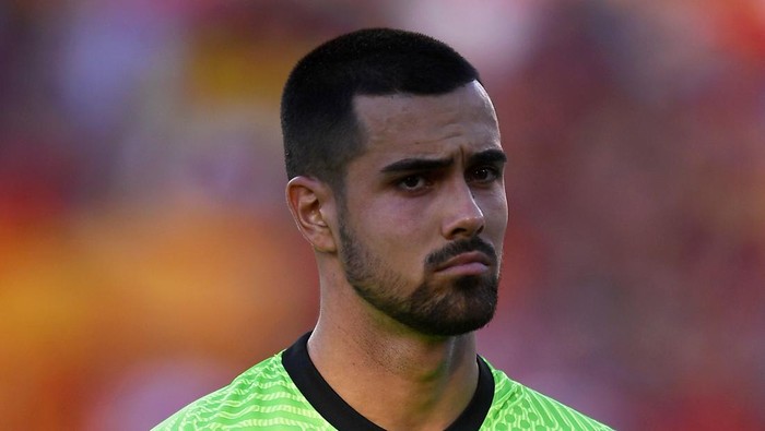 Portugal goalkeeper Diogo Costa stands on the pitch before the UEFA Nations League soccer match between Spain and Portugal, at the Benito Villamarin Stadium, in Seville, Spain, Thursday, June 2, 2022. (AP Photo/Jose Breton)