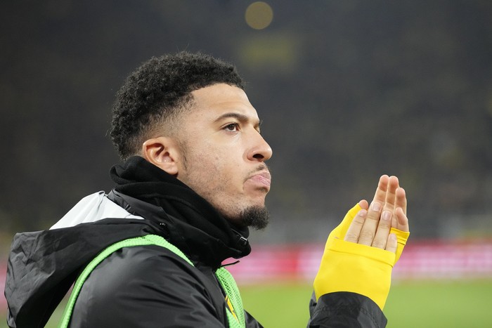Dortmunds Jadon Sancho warms up during the German Bundesliga soccer match between Borussia Dortmund and SC Freiburg in Dortmund, Germany, Friday, Feb. 9, 2024. (AP Photo/Martin Meissner)