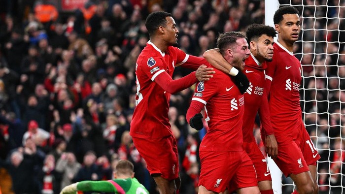 LIVERPOOL, ENGLAND - FEBRUARY 21: (THE SUN OUT. THE SUN ON SUNDAY OUT) Cody Gakpo of Liverpool celebrates after scoring the second Liverpool goal during the Premier League match between Liverpool FC and Luton Town at Anfield on February 21, 2024 in Liverpool, England. (Photo by John Powell/Liverpool FC via Getty Images)