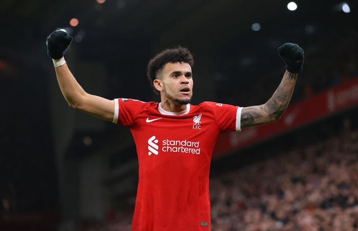 LIVERPOOL, ENGLAND - FEBRUARY 21: Luis Diaz of Liverpool FC celebrates after scoring their third goal during the Premier League match between Liverpool FC and Luton Town at Anfield on February 21, 2024 in Liverpool, England. (Photo by James Gill - Danehouse/Getty Images)