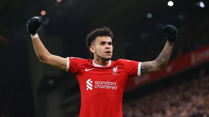 LIVERPOOL, ENGLAND - FEBRUARY 21: Luis Diaz of Liverpool FC celebrates after scoring their third goal during the Premier League match between Liverpool FC and Luton Town at Anfield on February 21, 2024 in Liverpool, England. (Photo by James Gill - Danehouse/Getty Images)