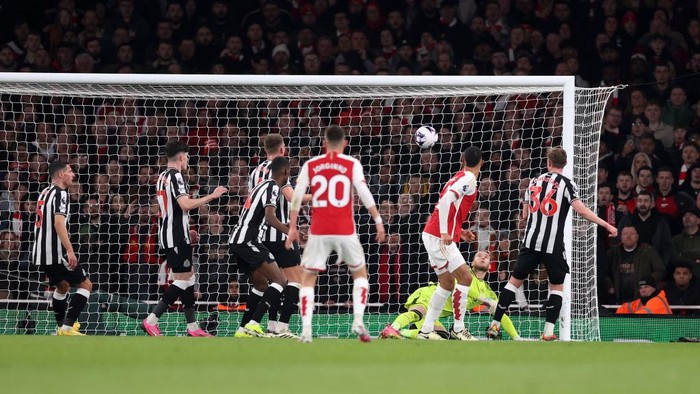 LONDON, ENGLAND - FEBRUARY 24: Gabriel of Arsenal (not pictured) heads a shot which is later deflected by Sven Botman of Newcastle United past teammate Loris Karius, resulting in an own-goal and Arsenals first goal during the Premier League match between Arsenal FC and Newcastle United at Emirates Stadium on February 24, 2024 in London, England. (Photo by Julian Finney/Getty Images)