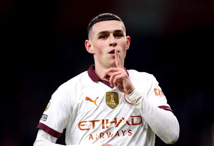 BOURNEMOUTH, ENGLAND - FEBRUARY 24: Phil Foden of Manchester City celebrates scoring his teams first goal during the Premier League match between AFC Bournemouth and Manchester City at the Vitality Stadium on February 24, 2024 in Bournemouth, England. (Photo by Clive Rose/Getty Images)