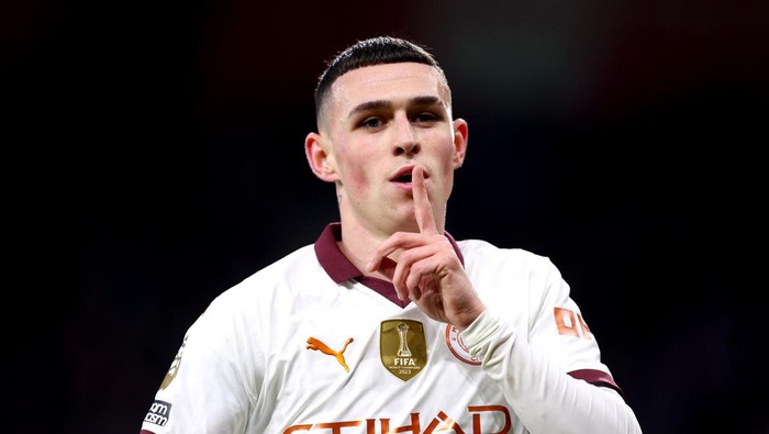 BOURNEMOUTH, ENGLAND - FEBRUARY 24: Phil Foden of Manchester City celebrates scoring his teams first goal during the Premier League match between AFC Bournemouth and Manchester City at the Vitality Stadium on February 24, 2024 in Bournemouth, England. (Photo by Clive Rose/Getty Images)