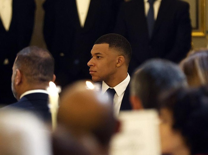 Paris Saint Germain's French forward Kylian Mbappe attends an official dinner on the sidelines of the Qatari Emir's state visit in Paris, on February 27, 2024. (Photo by Yoan VALAT / POOL / AFP)