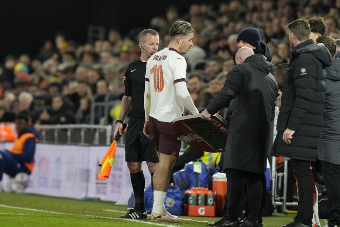 Manchester City's Jack Grealish leaves the field after substitution during the FA Cup 5th round soccer match between Luton Town and Manchester City at the Kenilworth Road Stadium in Luton, England, Tuesday, Feb. 27, 2024. (AP Photo/Alastair Grant)