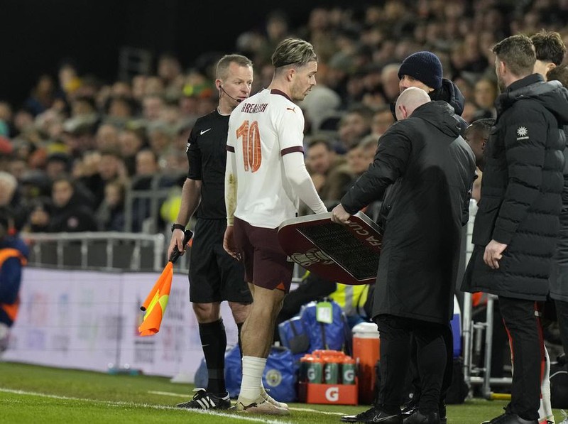 Manchester City's Jack Grealish leaves the field after substitution during the FA Cup 5th round soccer match between Luton Town and Manchester City at the Kenilworth Road Stadium in Luton, England, Tuesday, Feb. 27, 2024. (AP Photo/Alastair Grant)