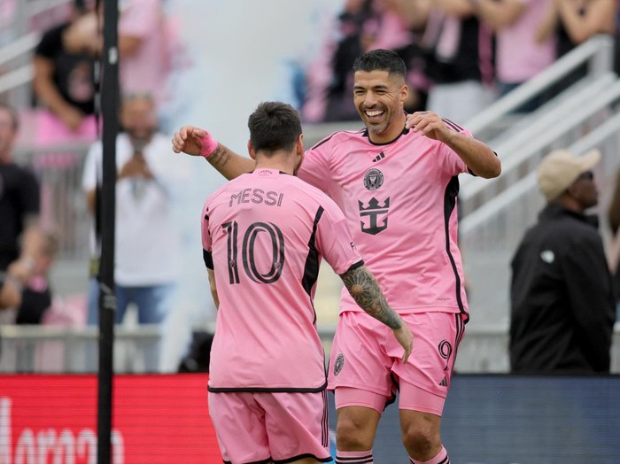 Mar 2, 2024; Fort Lauderdale, Florida, USA; Inter Miami CF forward Luis Suarez (9) celebrates with Inter Miami CF forward Lionel Messi (10) after scoring a goal during the first half against Orlando City at Chase Stadium. Mandatory Credit: Sam Navarro-USA TODAY Sports