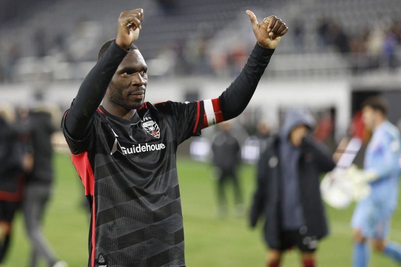 Feb 24, 2024; Washington, District of Columbia, USA; D.C. United forward Christian Benteke (20) gestures to the supporters section after D.C. United 's match against the New England Revolution at Audi Field. Mandatory Credit: Geoff Burke-USA TODAY Sports