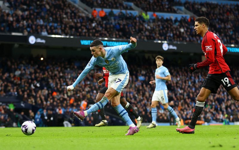 Soccer Football - Premier League - Manchester City v Manchester United - Etihad Stadium, Manchester, Britain - March 3, 2024 Manchester City's Phil Foden scores their second goal REUTERS/Carl Recine NO USE WITH UNAUTHORIZED AUDIO, VIDEO, DATA, FIXTURE LISTS, CLUB/LEAGUE LOGOS OR 'LIVE' SERVICES. ONLINE IN-MATCH USE LIMITED TO 45 IMAGES, NO VIDEO EMULATION. NO USE IN BETTING, GAMES OR SINGLE CLUB/LEAGUE/PLAYER PUBLICATIONS.