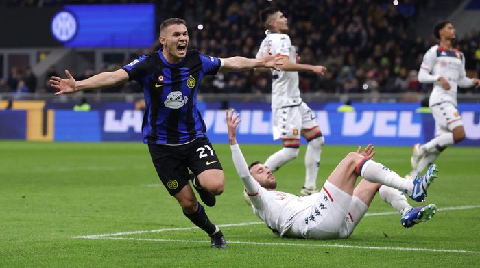 MILAN, ITALY - MARCH 04: Kristjan Asllani of FC Internazionale celebrates after scoring to give the side a 1-0 lead during the Serie A TIM match between FC Internazionale and Genoa CFC - Serie A TIM  at Stadio Giuseppe Meazza on March 04, 2024 in Milan, Italy. (Photo by Jonathan Moscrop/Getty Images)