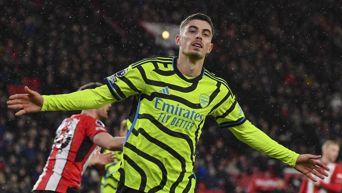 Arsenals Kai Havertz celebrates after scoring his sides fourth goal during the English Premier League soccer match between Sheffield United and Arsenal at the Bramall Lane stadium in Sheffield, England, Monday, March 4, 2024. (AP Photo/Rui Vieira)