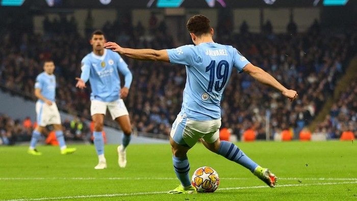 Soccer Football - Champions League - Round of 16 - Second Leg - Manchester City v FC Copenhagen - Etihad Stadium, Manchester, Britain - March 6, 2024 Manchester City's Julian Alvarez scores their second goal REUTERS/Carl Recine
